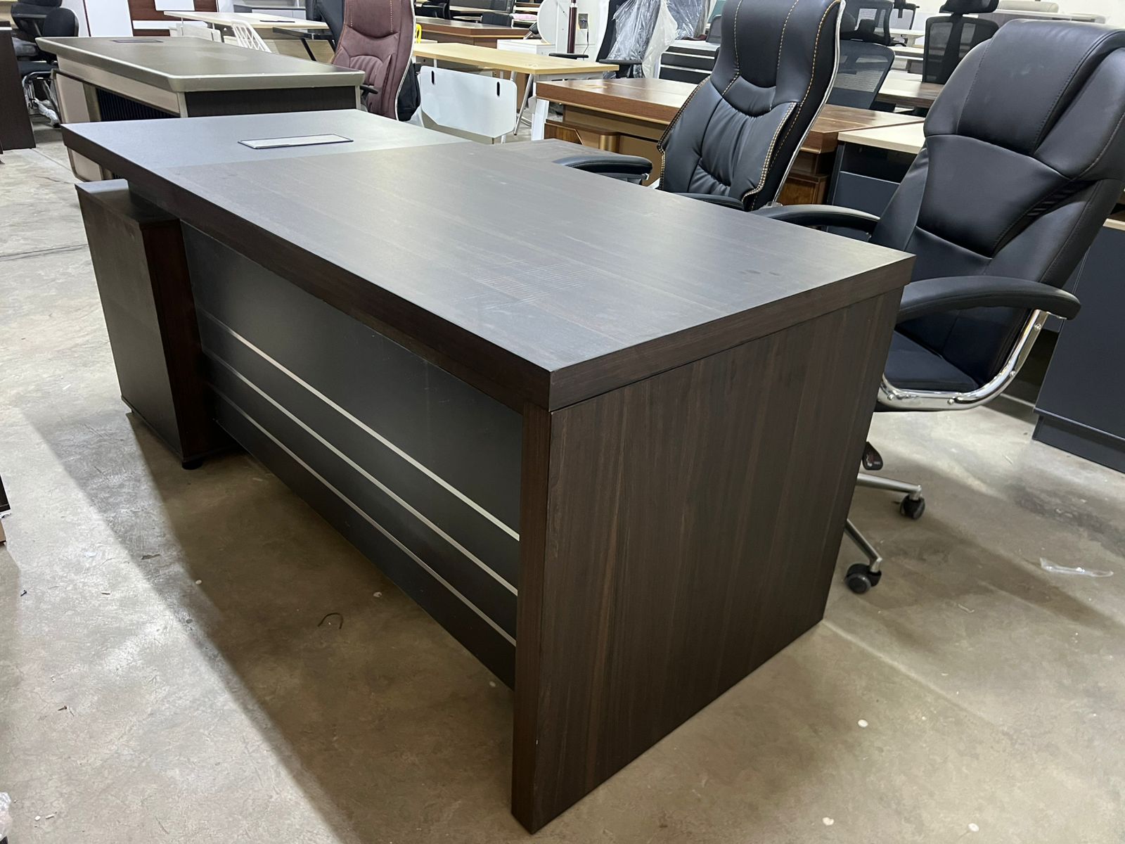 executive directors desk,directors executive office desk,modern executive desk for directors,luxury directors desk,high-end executive directors desk,wooden executive directors desk,executive desk for director’s cabin,office executive desk for directors,directors desk with storage,executive desk with drawers and cabinets,director level office furniture,executive office desk for top management,modern directors desk with return,executive L-shaped directors desk,directors desk with leather inlay,executive U-shaped directors desk,premium directors executive desk,solid wood executive directors desk,large executive desk for directors office,director’s desk with filing cabinet,modern executive office furniture desk,contemporary directors office desk,executive desk with modesty panel,ergonomic executive desk for directors,directors office desk with shelves,directors desk with hutch,executive desk with built-in storage,executive director's office workstation,custom executive directors desk,directors desk with return and pedestal,executive manager desk,director’s office table modern design,directors desk with cable management,executive desk with luxury finish,directors desk with matching credenza,executive director’s office desk set,executive office furniture for directors,executive desk with integrated drawers,director's office furniture modern,executive corner desk for directors,modern luxury executive desk,directors workstation with return,executive desk with tech ports,executive director's desk with file drawer,mahogany directors executive desk,oak executive directors desk,walnut directors desk,glass top executive desk,director desk with writing pad,executive manager office table,executive desk setup for directors,directors desk with ergonomic design,leather top executive desk,executive desk with bookshelf,director’s workstation desk,executive desk with storage compartments,executive desk for boardroom use,director’s cabin executive table,executive writing table for directors,directors desk for large office,executive desk for CEO office,directors table with smart features,directors office furniture set,wood veneer directors desk,executive desk suite for directors,executive table for managing director,modular executive desk for directors,executive directors desk L-shape,high-end office desk for director,custom made directors desk,executive desk with privacy panel,executive desk with return and side table,directors desk with elegant design,directors executive table with drawers,executive office table for director cabin,directors desk with floating top,executive table set for directors office,director desk with meeting extension,directors table with executive storage,executive director table modern finish,director’s desk with under desk storage,executive office setup for director,cabin desk for directors,executive desk for management level,wood and metal directors desk,executive desk with return unit,executive office workstation for directors,executive directors desk contemporary,directors executive office workstation,directors office desk sleek design,directors desk with lacquer finish,executive director’s desk modular system,large executive desk for office director,directors office desk modern wood,executive office table for decision makers,executive desk with built-in power outlets,director’s desk with multifunctional drawers,director’s desk with corner return,executive director’s desk high gloss,executive directors desk for corner offices,director desk for corporate office,executive desk with cable grommets,modern desk for directors with storage,executive suite desk for top executives,director executive office furniture,directors office desk with tech access,executive desk with luxurious accents,director desk with polished wood finish,executive office desk with matching return,ergonomic directors table setup,executive office table with conference end,directors desk with premium finish,executive desk for luxury office,contemporary executive desk for directors,directors desk built for efficiency,directors table for leadership team,executive desk with under desk cabinet,director executive desk with gloss surface,director desk with custom fit drawers,executive desk with center drawer,director desk with pen tray,executive desk for professionals,directors table for administrative use,directors desk made with engineered wood,executive furniture desk for managing team,executive office furniture complete desk,directors desk setup with chair space,directors executive office table large,executive office furniture with sleek desk,directors office table with soft close drawers,directors workstation modern wood finish,directors desk with digital access panel,executive furniture layout with directors desk,executive office layout with desk return,directors desk with premium wood laminate,executive desk with monitor shelf,director desk with footrest drawer,executive desk made for meetings,directors desk and file cabinet set,director office table smart storage,executive table setup for CEO and directors,executive director desk center unit,modern executive furniture desk for directors,executive manager table with desk,executive workstation desk for director room,director desk with multiple compartments,directors desk with laptop tray,executive directors desk rich wood,director desk with flip-top power box,executive director’s desk commanding design,directors cabin desk with side storage,director desk and meeting table combo,executive office setup with corner desk,director table for professional environment,executive desk for leadership roles,modern executive table for senior managers,director desk with statement design,executive office furniture with tech panel,directors table with pull-out worktop,directors office desk minimalist design,director’s desk with elegant detailing,executive table with rounded edges,directors desk with workstation return,executive furniture layout with table,directors workstation with soft touch surface,executive desk with push-to-open drawers,director desk for fast-paced office,executive table for operational management,directors desk with chrome details,executive desk for smart workspace,directors desk for VIP office