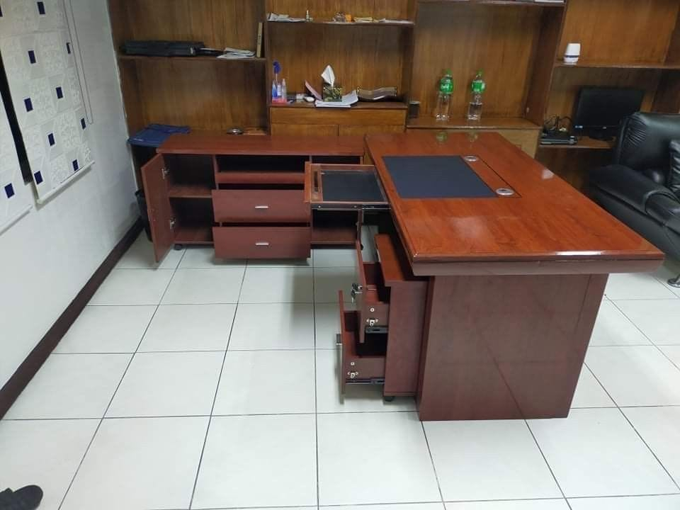 mahogany office desk, solid mahogany desk, luxury wooden desk, premium mahogany workstation, dark wood office table, executive mahogany desk, traditional wooden writing desk, antique style mahogany desk, high-end home office desk, rich mahogany computer desk, classic executive desk, polished mahogany writing table, real wood office furniture, vintage mahogany desk, dark brown wooden desk, luxury study table, master bedroom desk, l-shaped mahogany desk, mahogany desk with drawers, double pedestal mahogany desk, presidential mahogany table, lawyer office desk, corporate ceo desk, hand-crafted wood desk, artisan mahogany furniture, custom wooden office desk, heirloom quality desk, heavy-duty wooden desk, scratch-resistant mahogany table, gloss finish wood desk, matte finish mahogany desk, mid-century modern mahogany desk, rustic mahogany computer table, colonial style office desk, queen anne mahogany desk, leather inlay mahogany desk, brass hardware office desk, lockable drawer wooden desk, file cabinet mahogany desk, large corporate office desk, space-saving mahogany table, compact dark wood desk, minimalist mahogany workstation, upscale home office setup, professional work from home desk, status symbol executive desk, heavy load capacity wood table, thick tabletop mahogany desk, carved wood office desk, timeless design office furniture, sophisticated study desk, elegant writing workstation, premium wood furniture, wholesale executive desks, affordable luxury wood desk, top-rated mahogany desk, commercial grade wooden desk, bifma certified office desk, tech-integrated mahogany table, wire management wood desk, hidden storage office desk, panel base mahogany desk, bow front executive desk, u-shaped mahogany workstation, corner dark wood desk, designer office furniture, bespoke mahogany table, private office centerpiece, showroom quality desk, rich grain wooden table