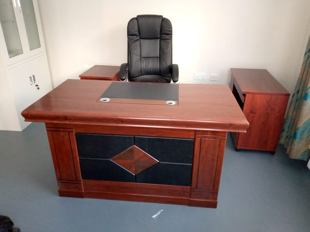 executive office desk, executive desk, luxury office desk, modern executive desk, wooden executive desk, premium office desk, manager desk, CEO office desk, professional office desk, executive workstation, office furniture desk, high end office desk, large office desk, ergonomic executive desk, office desk with drawers, office desk with storage, executive office furniture, corporate office desk, business executive desk, solid wood office desk, L shaped executive desk, U shaped executive desk, modern office furniture, stylish executive desk, office workstation desk, premium wooden desk, luxury executive furniture, office desk design modern, professional workspace desk, office cabin desk, manager workstation, office table executive style, executive computer desk, executive writing desk, office desk for managers, office desk for directors, office desk for professionals, high quality office desk, durable executive desk, contemporary office desk, minimalist executive desk, spacious office desk, office desk with cabinets, office desk with filing drawers, office desk with keyboard tray, office desk with lockable drawers, office furniture solutions, office desk supplier, office desk manufacturer, office furniture Kenya, Nairobi office desk, executive desk Nairobi, office desk Kenya, office furniture Nairobi, office desk supplier Kenya, executive office furniture Kenya, corporate furniture Kenya, office workstation Kenya, premium office furniture Kenya, office desk wholesale Kenya, office desk retail Kenya, office furniture supplier Nairobi, modern office desk Kenya, office desk for executives Nairobi, office desk for CEOs Kenya, office desk for managers Nairobi, office desk installation Kenya, office furniture installation Nairobi, office desk customization, custom executive desk, bespoke office desk, office desk solutions, office workspace furniture, office interior furniture, office desk collections, office desk catalogue, office furniture catalogue, office desk deals, office desk sale, office furniture trends, office workspace optimization, office productivity furniture, office desk for productivity, office desk for leadership offices, executive workspace setup, luxury office furniture Kenya, office desk for boardrooms, office desk for private offices, office desk with premium finish, office desk ergonomic design, office desk for long hours, office desk with cable management, office desk with modern design, office desk with steel frame, office desk with wood finish, office desk for corporate executives, office desk for home office executives, office furniture solutions Kenya, executive desk supplier Nairobi, office desk showroom Kenya, office desk buying guide, office desk for modern offices, executive office setup furniture, office desk with storage solutions, office desk for professional environments