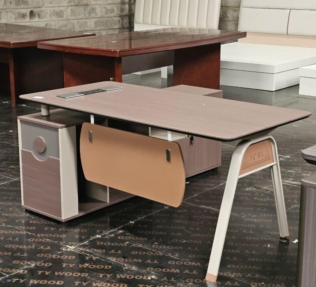 L-shaped office desk, L shaped office desk, L-shaped desk, corner office desk, office desk, office table, executive office desk, modern office desk, office workstation desk, computer desk, ergonomic office desk, professional office desk, corporate office desk, home office desk, study desk, writing desk, work desk, office furniture desk, office furniture table, workspace desk, office workstation, executive workstation desk, L shaped workstation, corner workstation, dual surface desk, side return desk, executive corner desk, manager office desk, director office desk, CEO office desk, large office desk, spacious office desk, 120cm L shaped desk, 140cm L shaped desk, 160cm L shaped desk, 180cm L shaped desk, 2.4m L shaped desk, 3m L shaped desk, wooden L shaped desk, MDF L shaped desk, engineered wood desk, laminate office desk, melamine office desk, solid wood desk, oak office desk, walnut office desk, mahogany office desk, black office desk, white office desk, grey office desk, brown office desk, metal frame desk, steel frame office desk, durable office desk, heavy duty office desk, strong office desk, scratch resistant desk, heat resistant desk, modern design desk, minimalist office desk, contemporary office desk, stylish office desk, elegant office desk, premium office desk, affordable office desk, executive furniture desk, office desk with drawers, office desk with storage, office desk with cabinet, office desk with shelves, office desk with side return, office desk with keyboard tray, office desk with cable management, office desk with CPU stand, office desk with grommets, adjustable office desk, sit stand L shaped desk, height adjustable L shaped desk, ergonomic workstation furniture, productivity desk, multitasking office desk, dual monitor desk, computer setup desk, office desk for laptop, office desk for desktop PC, office desk for gaming setup, office desk for home office setup, office desk for corporate office, office desk for startups, office desk for managers, office desk for directors, office desk for executives, office desk for professionals, office desk for programmers, office desk for designers, office desk for coworking spaces, office desk for small office, office desk for large office, office desk for boardroom, office desk for meeting room, office desk for reception office, modern office furniture, executive office furniture, corporate workspace furniture, office interior furniture, office setup furniture, office desk Kenya, L shaped desk Kenya, office desk Nairobi, L shaped desk Nairobi, buy office desk online, office desk online store, office desk showroom, office desk supplier, office desk manufacturer, office desk wholesale, office desk retail, office desk deals, office desk sale, office desk price, office desk delivery, office desk models, office desk designs, office desk series, office desk collection, office furniture Kenya, workspace solutions Kenya