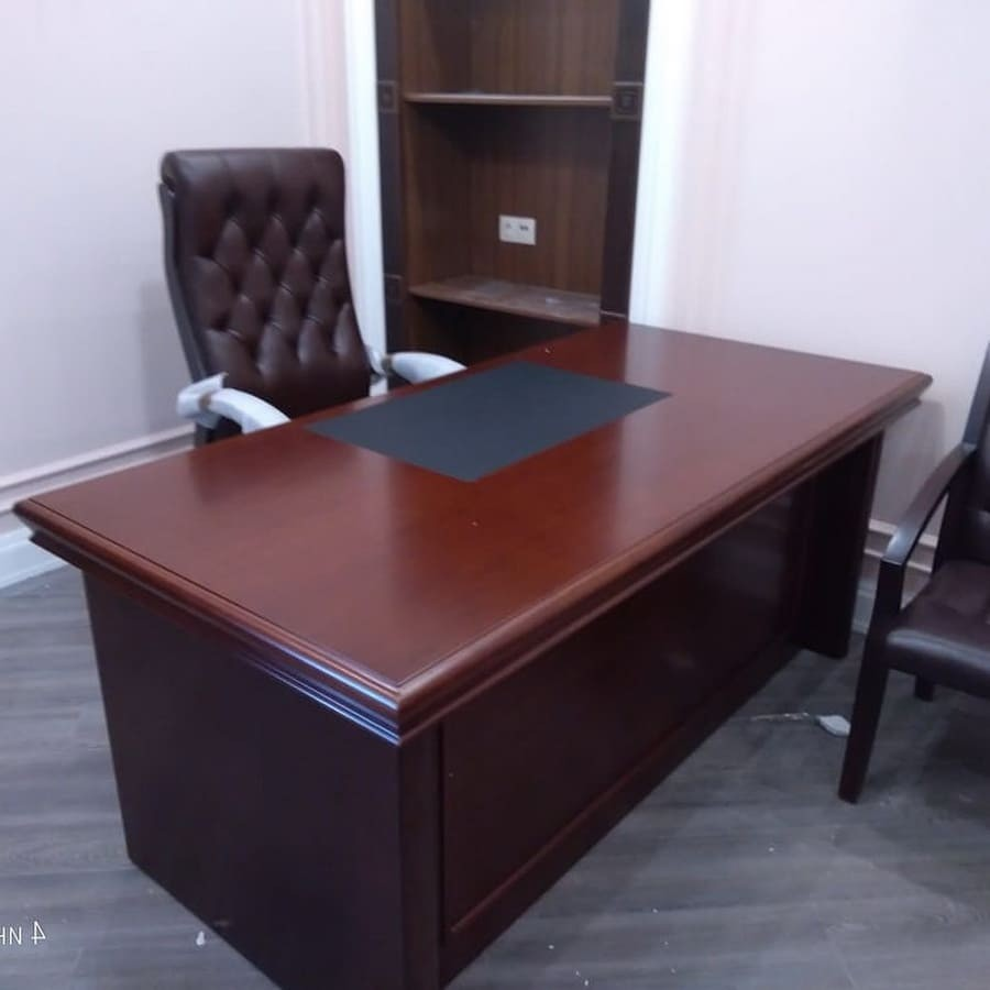 mahogany office desk, solid mahogany desk, luxury wooden desk, premium mahogany workstation, dark wood office table, executive mahogany desk, traditional wooden writing desk, antique style mahogany desk, high-end home office desk, rich mahogany computer desk, classic executive desk, polished mahogany writing table, real wood office furniture, vintage mahogany desk, dark brown wooden desk, luxury study table, master bedroom desk, l-shaped mahogany desk, mahogany desk with drawers, double pedestal mahogany desk, presidential mahogany table, lawyer office desk, corporate ceo desk, hand-crafted wood desk, artisan mahogany furniture, custom wooden office desk, heirloom quality desk, heavy-duty wooden desk, scratch-resistant mahogany table, gloss finish wood desk, matte finish mahogany desk, mid-century modern mahogany desk, rustic mahogany computer table, colonial style office desk, queen anne mahogany desk, leather inlay mahogany desk, brass hardware office desk, lockable drawer wooden desk, file cabinet mahogany desk, large corporate office desk, space-saving mahogany table, compact dark wood desk, minimalist mahogany workstation, upscale home office setup, professional work from home desk, status symbol executive desk, heavy load capacity wood table, thick tabletop mahogany desk, carved wood office desk, timeless design office furniture, sophisticated study desk, elegant writing workstation, premium wood furniture, wholesale executive desks, affordable luxury wood desk, top-rated mahogany desk, commercial grade wooden desk, bifma certified office desk, tech-integrated mahogany table, wire management wood desk, hidden storage office desk, panel base mahogany desk, bow front executive desk, u-shaped mahogany workstation, corner dark wood desk, designer office furniture, bespoke mahogany table, private office centerpiece, showroom quality desk, rich grain wooden table