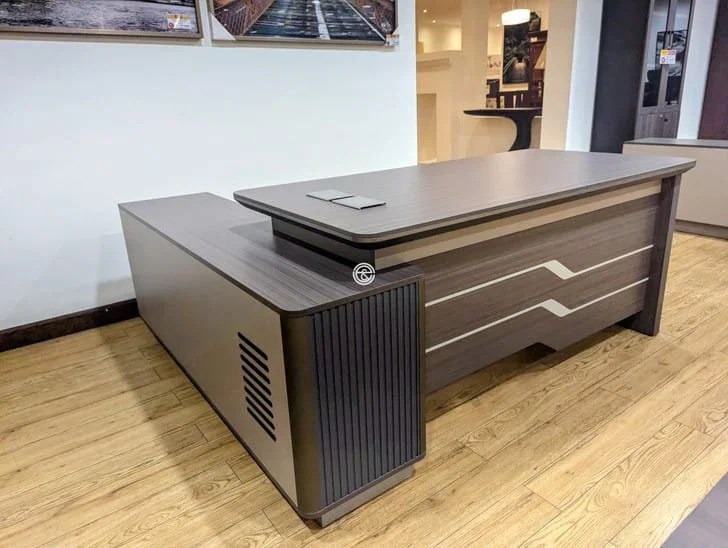 Luxury Workspace for Modern Professionals Transform your office with the 1.8 Meters Imported Executive Office Desk, a premium workstation designed for executives, managers, and professionals who require a spacious, stylish, and highly functional workspace. With its generous 180cm desktop surface, this executive desk provides ample room for computers, documents, office accessories, and daily business activities while creating an impressive professional atmosphere. Moreover, this imported executive desk combines elegant design with superior craftsmanship to enhance modern office interiors. Its large working surface allows better organization and productivity, while the refined finish adds a sophisticated touch to executive offices, boardrooms, and corporate workspaces. The deskβs practical layout supports efficient workflow while maintaining a clean and professional appearance. Additionally, the 1.8 Meters Imported Executive Office Desk features a durable construction designed for long-term office use. Its premium materials, stable structure, and executive styling make it an excellent choice for businesses seeking high-quality office furniture that delivers both performance and visual appeal. β¨ Key Features π₯οΈ Spacious 1.8 Meter Desktop Provides an expansive working area for multiple monitors, laptops, documents, and essential office equipment. πΌ Imported Executive Design Features a premium appearance that enhances executive offices, management rooms, and corporate environments. πͺ Durable Premium Construction Built with high-quality materials to ensure strength, stability, and long-lasting daily performance. π Efficient Workspace Organization Offers plenty of room to arrange office essentials while maintaining a neat and productive workspace. β¨ Elegant Professional Finish Adds a luxurious and modern look that complements high-end office interiors. π’ Ideal for Executive Offices Perfect for company directors, managers, business owners, and professionals requiring a premium workstation. π Large Functional Work Surface Supports comfortable multitasking with enough space for meetings, paperwork, and technology devices. π§Ή Easy Maintenance Design Features a smooth surface that allows convenient cleaning and keeps the desk looking professional. π Product Specifications π₯οΈ Product Type: Imported Executive Office Desk π Size: 1.8 Meters (180cm) ποΈ Material: Premium Office-Grade Wood / Engineered Board (model dependent) π¨ Finish: Luxury Executive Finish π» Suitable For: Computers, Monitors, Documents, Office Accessories & Meetings π’ Applications: Executive Offices, Manager Rooms, Boardrooms, Corporate Workspaces & Home Offices π Why Choose the 1.8 Meters Imported Executive Office Desk? The 1.8 Meters Imported Executive Office Desk offers the ideal combination of luxury, functionality, and durability. Furthermore, its spacious design helps professionals manage daily tasks more efficiently while creating a powerful executive presence. With its premium appearance and practical workspace, this desk is an excellent investment for businesses looking to build a comfortable and impressive office environment.